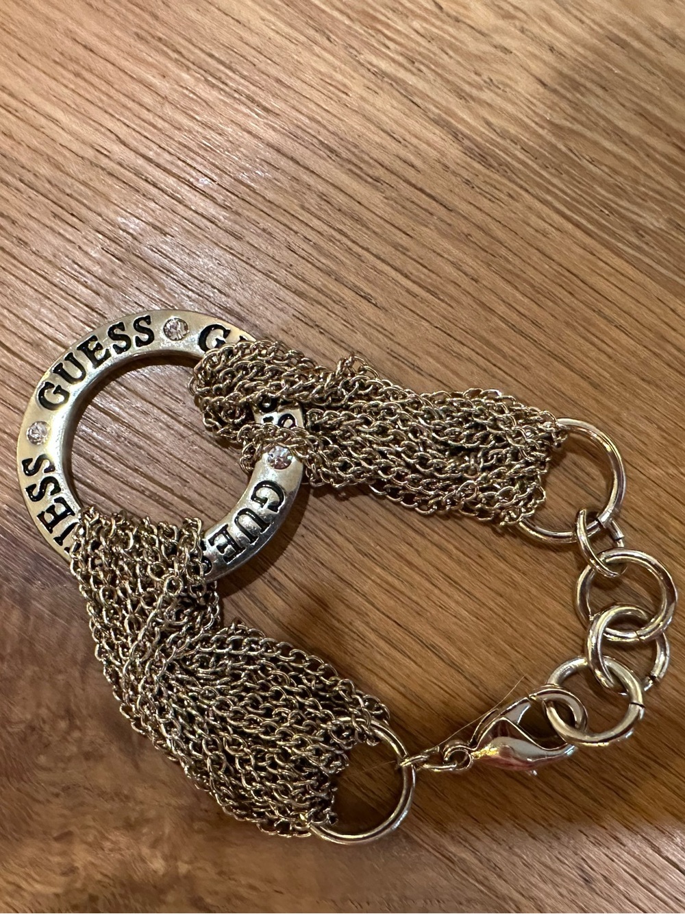 GUESS Gold-Tone Multi-Chain Logo Ring Bracelet with Crystal Accents - Picture 6 of 8